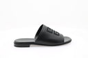 Sandales plates en cuir noir GIVENCHY avec logo embossé, style mule.
